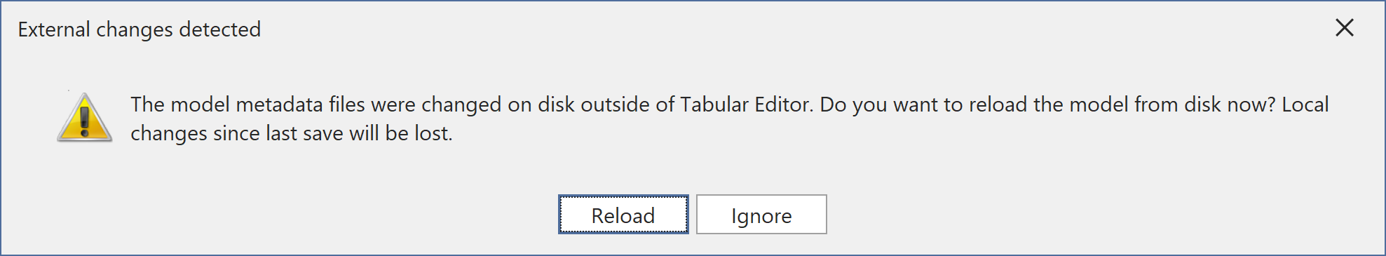 External changes detected prompt with the Reload and Ignore buttons, Reload focused